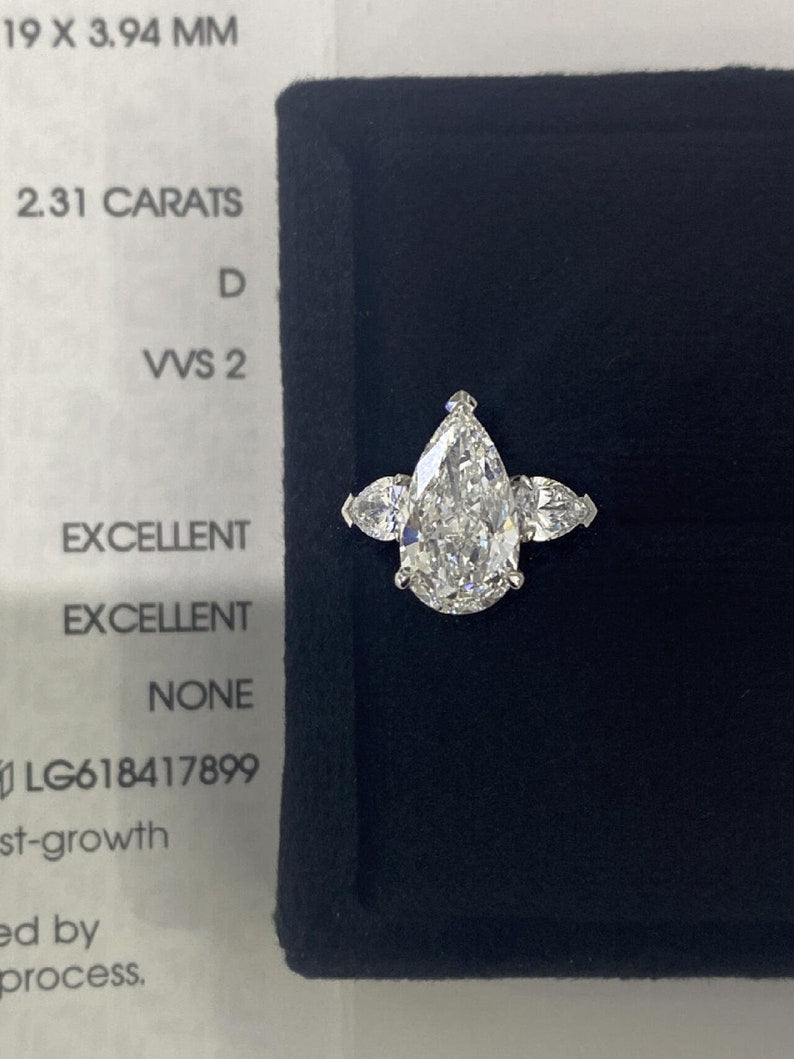 Marquise Shaped Three Stone Lab Grown Diamond Engagement Ring